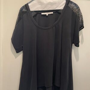 Ulla Johnson black flowy blouse with knit shoulders